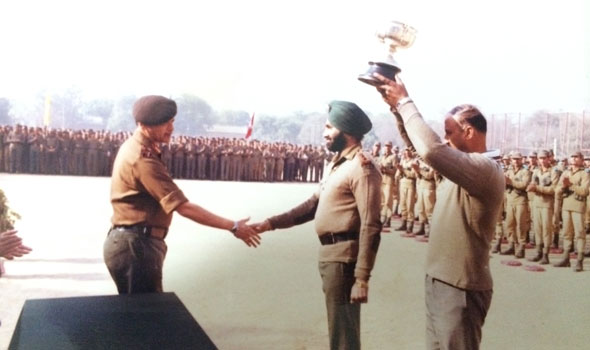 Maj H S Kalsi and Sub Kalyan Singh receiving Inter Company Championship Banner from Brig V K Bhave.
